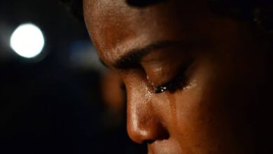 Black woman crying file photo