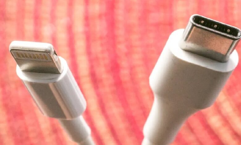 A USB Type C charger right beside Apples proprietary Lightning cable